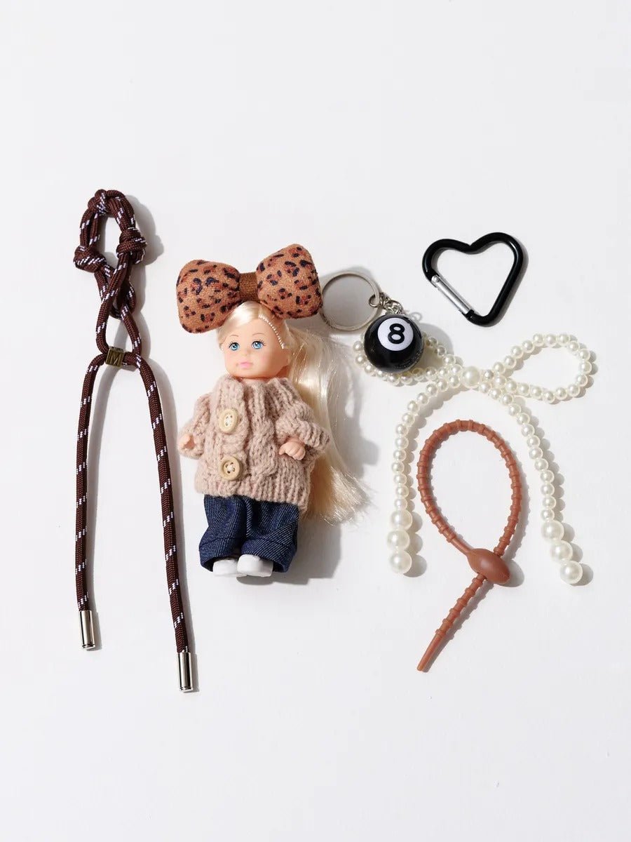 Bijou de sac poupée, porte - clés perles, accessoire fantaisie, ruban léopard, mini peluche, modèle Enastie - Beige