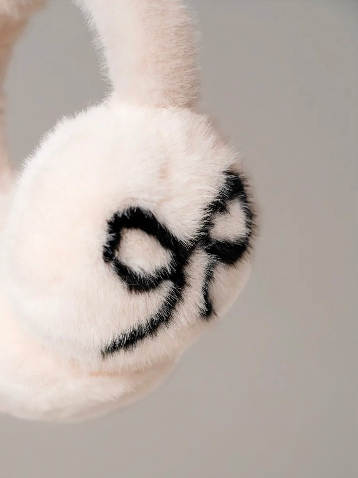 Cache - oreilles femme hiver, fourrure douce éco, motif nœud contrasté, confort thermique, protection vent et froid, accessoire mode cocooning, modèle Diksi - Cache - oreilles - Blanc