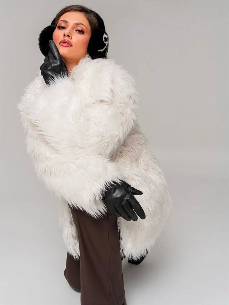 Cache - oreilles femme hiver, fourrure douce éco, motif nœud contrasté, confort thermique, protection vent et froid, accessoire mode cocooning, modèle Diksi - Cache - oreilles - Noir