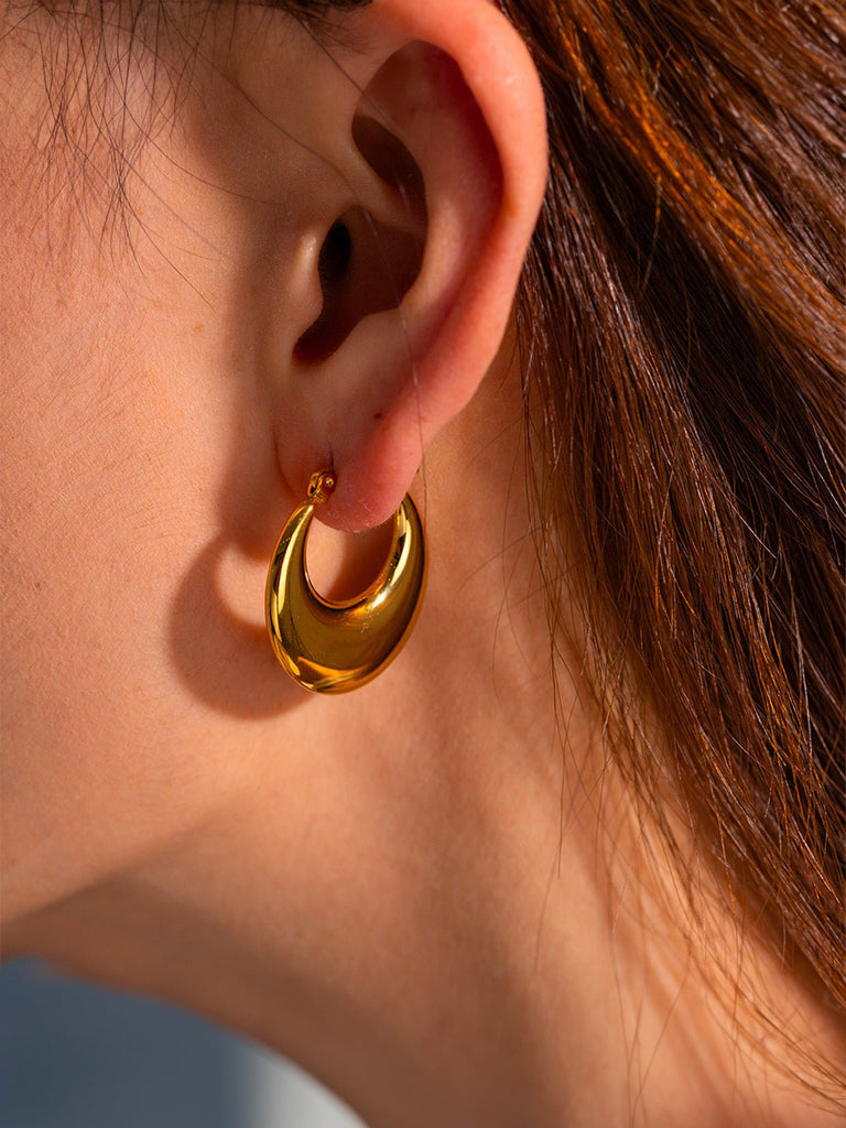 Créoles bombées dorées, boucles d'oreilles U, acier inoxydable, design géométrique, look lumineux, modèle Hinam - Boucles d'oreilles - Or