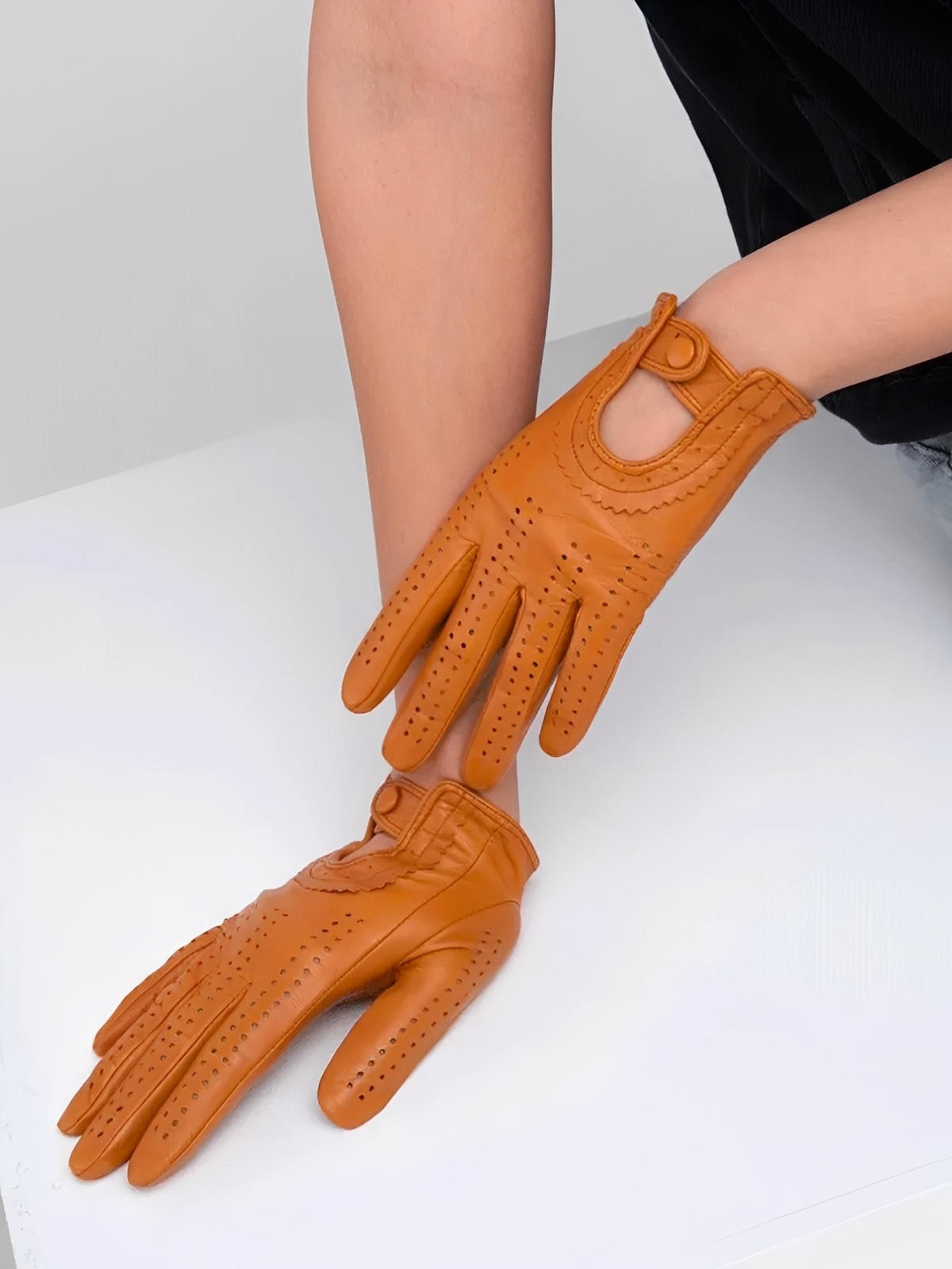 Women's lamb leather gloves, lightweight perforated model for mid-season, unlined design with snap button, ideal for driving and daily use, soft and comfortable, Emira model
