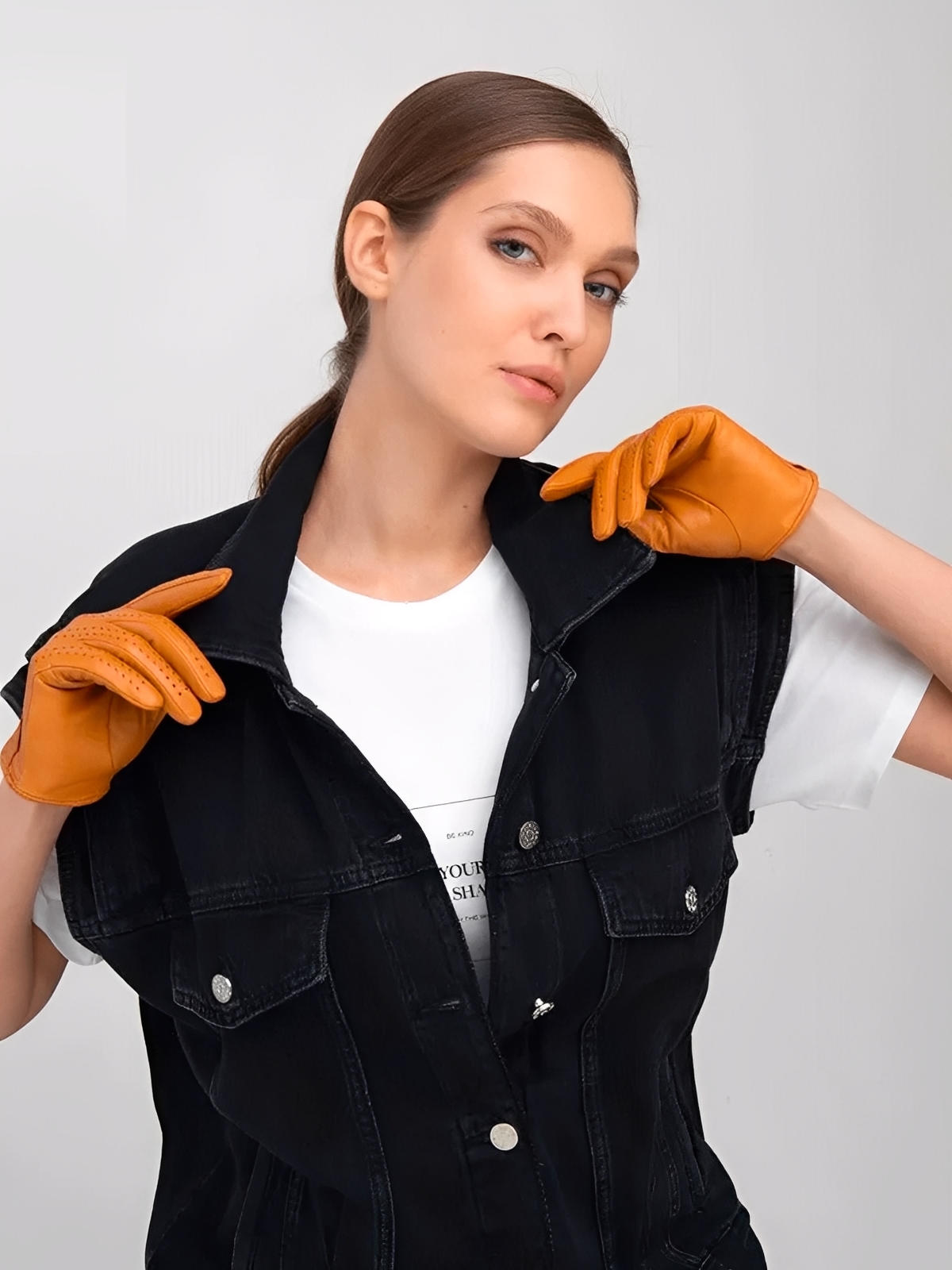 Women's lamb leather gloves, lightweight perforated model for mid-season, unlined design with snap button, ideal for driving and daily use, soft and comfortable, Emira model