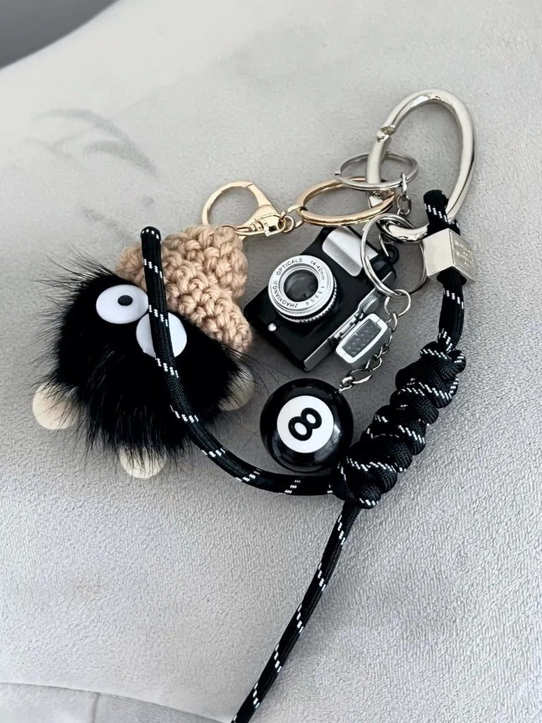 Bijou da borsa, peluche nera con cappello, mini macchina fotografica, palla 8, corda intrecciata, portachiavi, modello Labu