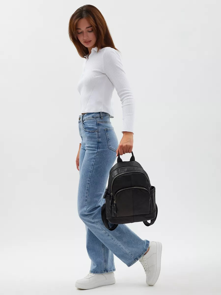 Black leather backpack for women, compact size, zippered pockets, adjustable straps, urban design, Mana model