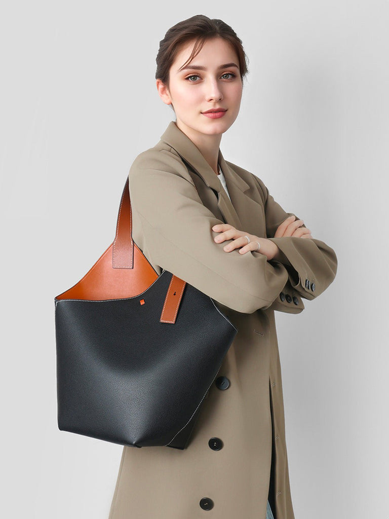 Sac seau en cuir, porté épaule, design minimaliste, grand volume, fermeture boucle, modèle tendance, modèle Marla - Sac à main - Noir