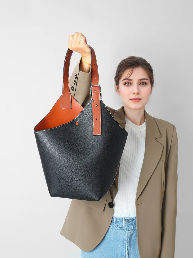 Sac seau en cuir, porté épaule, design minimaliste, grand volume, fermeture boucle, modèle tendance, modèle Marla - Sac à main - Noir