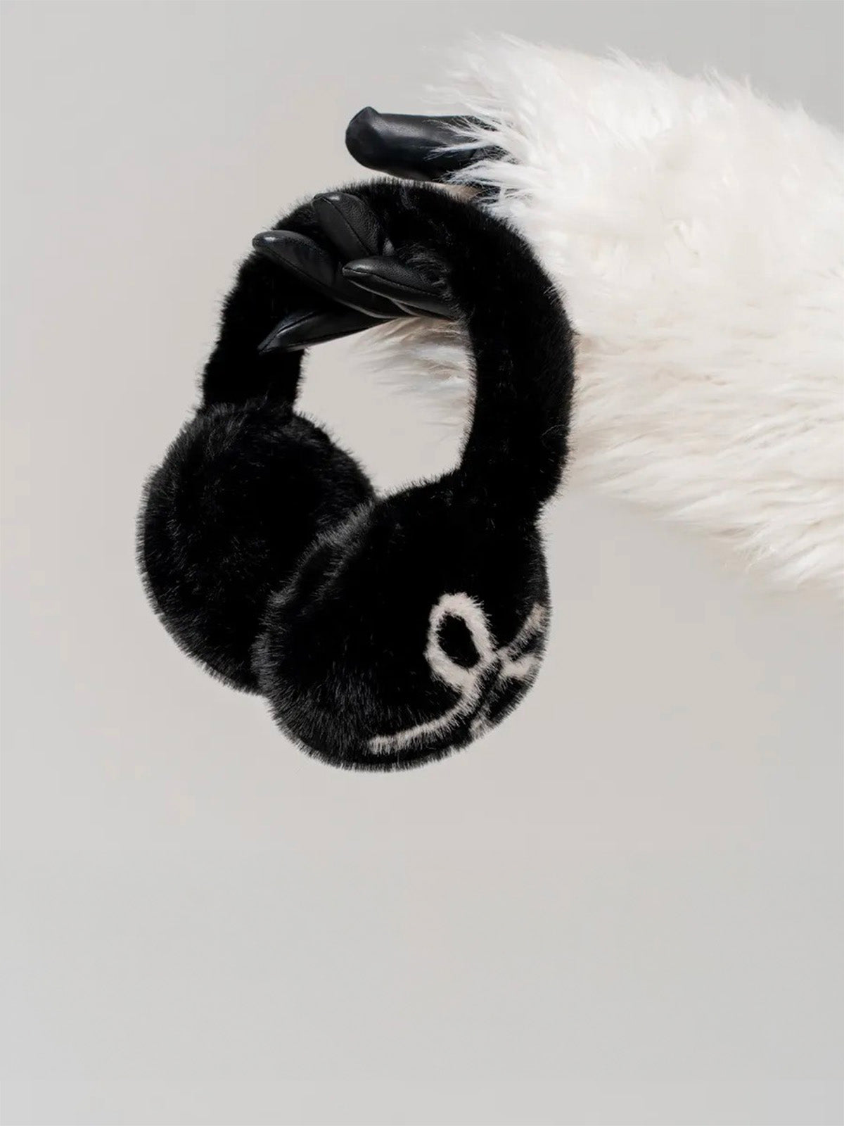 Cache-oreilles femme hiver, fourrure douce éco, motif nœud contrasté, confort thermique, protection vent et froid, accessoire mode cocooning, modèle Diksi