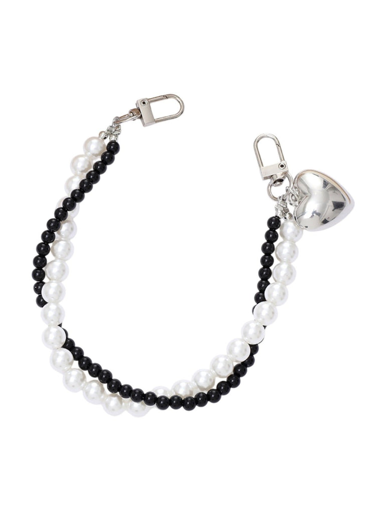Bijou de sac cœur, perles nacrées, perles noires, perles argentées, double chaîne, mousquetons, modèle Delaya - Noir