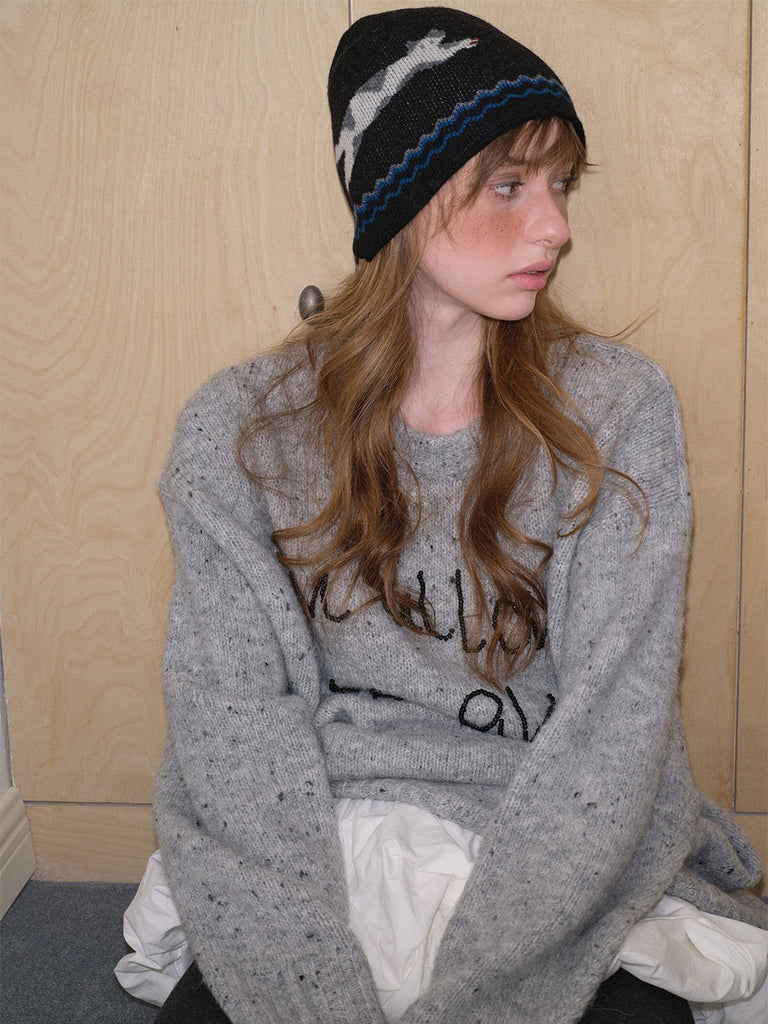 Bonnet en laine douce, design chat en tricot, chaud et confortable, style streetwear hiver, gris ou noir, motif animalier original, coupe ajustée, mode urbaine cosy, modèle Mimie - Bonnets - Noir