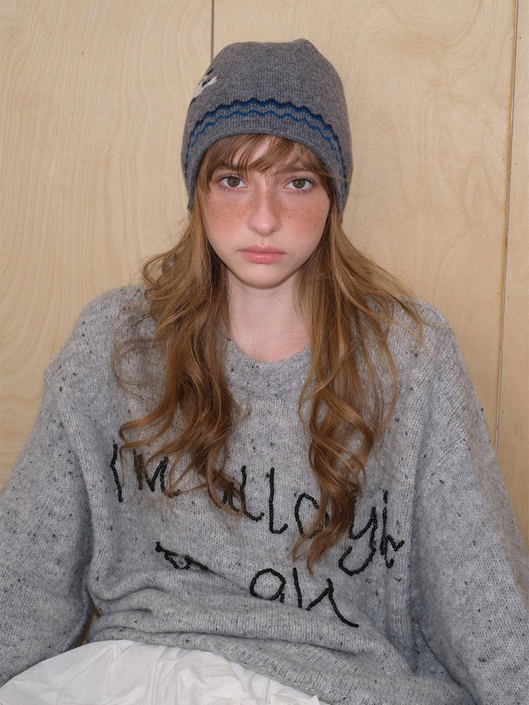 Bonnet en laine douce, design chat en tricot, chaud et confortable, style streetwear hiver, gris ou noir, motif animalier original, coupe ajustée, mode urbaine cosy, modèle Mimie - Bonnets - Gris