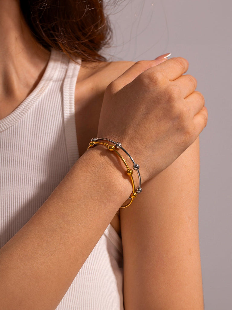 Bracelet acier inoxydable doré, bijou géométrique moderne, jonc rigide rond, style minimaliste femme, modèle Zendaya - Bracelet - Or