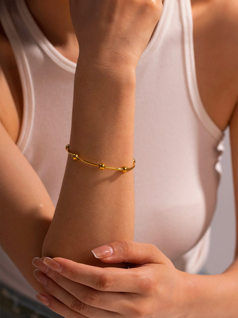 Bracelet acier inoxydable doré, bijou géométrique moderne, jonc rigide rond, style minimaliste femme, modèle Zendaya - Bracelet - Or