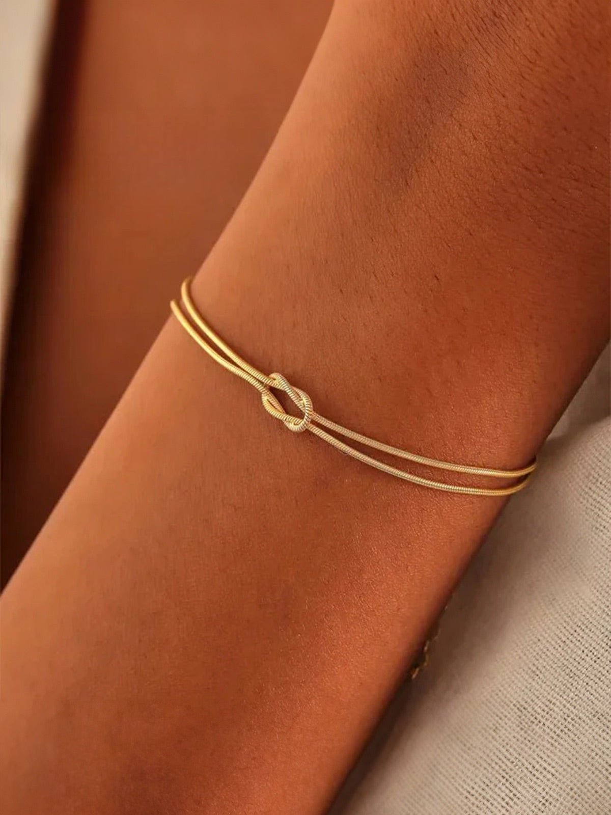 Bracelet chaîne serpent, nœud central, acier inoxydable, doré ou argenté, ajustable, modèle Link - Bracelet - Or