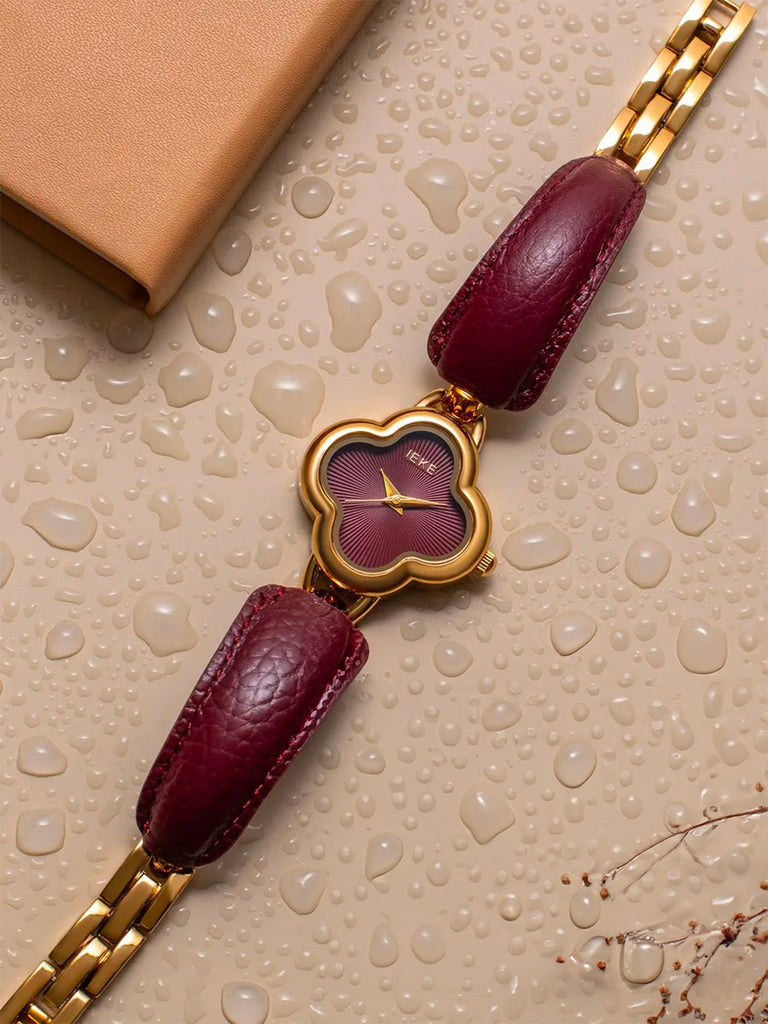 Montre femme bordeaux, cadran trèfle doré, bracelet cuir et acier, quartz japonais, accessoire chic, modèle Tissa - Montre - Bordeaux