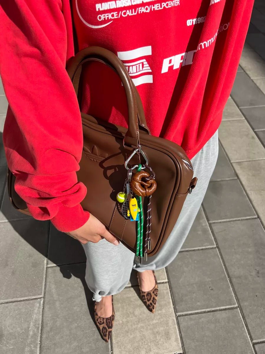 Porte - clés sac fantaisie, breloques sport et fun, banane lego, bretzel, tennis, corde colorée, modèle Vayana - Multicolore