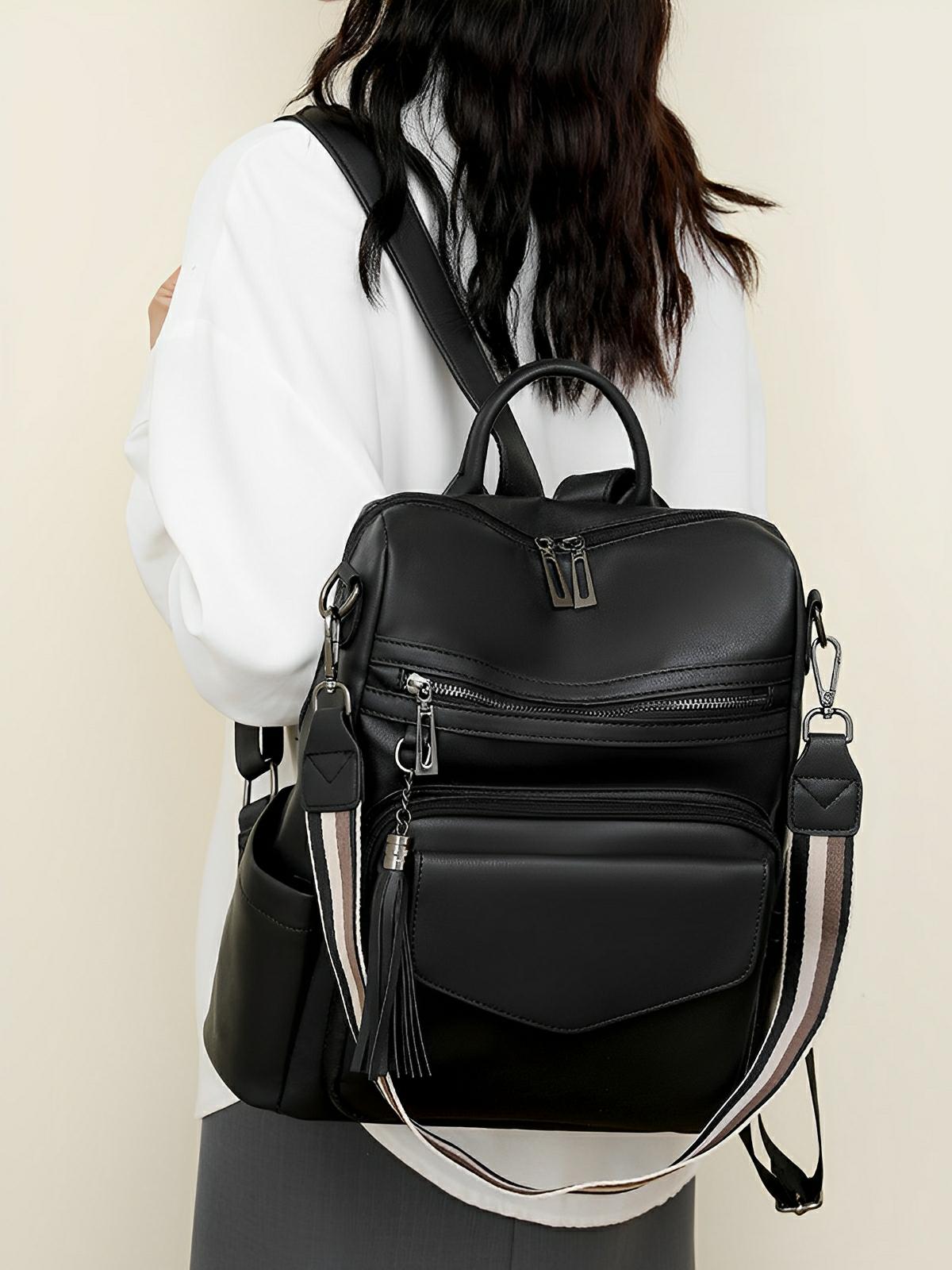 Sac à dos femme en simili vegan avec pochette, bicolore, grande capacité, détails franges, design urbain chic, modèle Lannah - Sac à dos - Noir