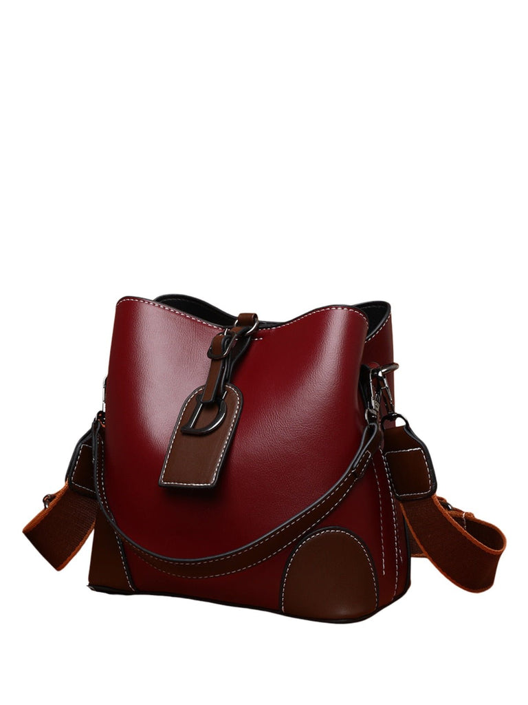 Sac à main femme "D" brillant métallisé, sac bandoulière, format seau, spacieux et organisé, idéal quotidien, modèle Djonia - Sac à main - Bordeaux