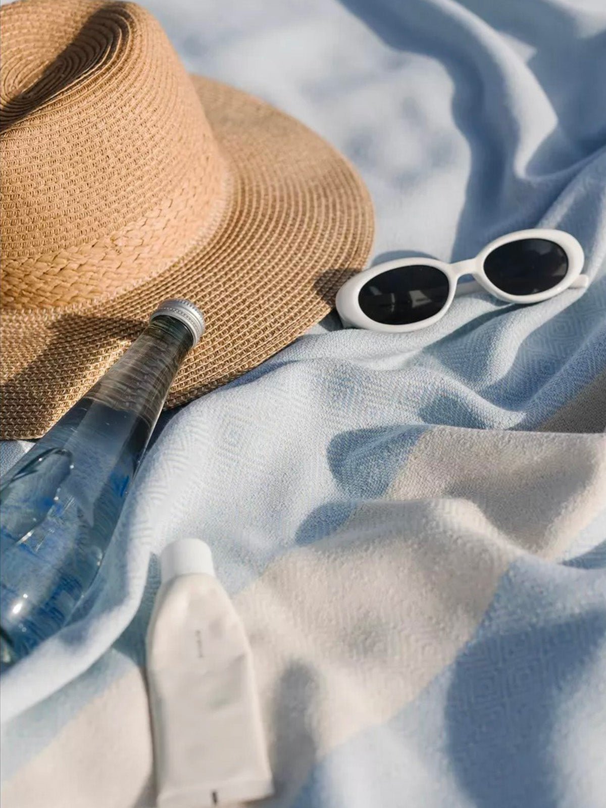 Serviette plage hammam coton, grande taille légère, séchage rapide, motif losange, franges tressées, modèle Ténor - Bleu ciel