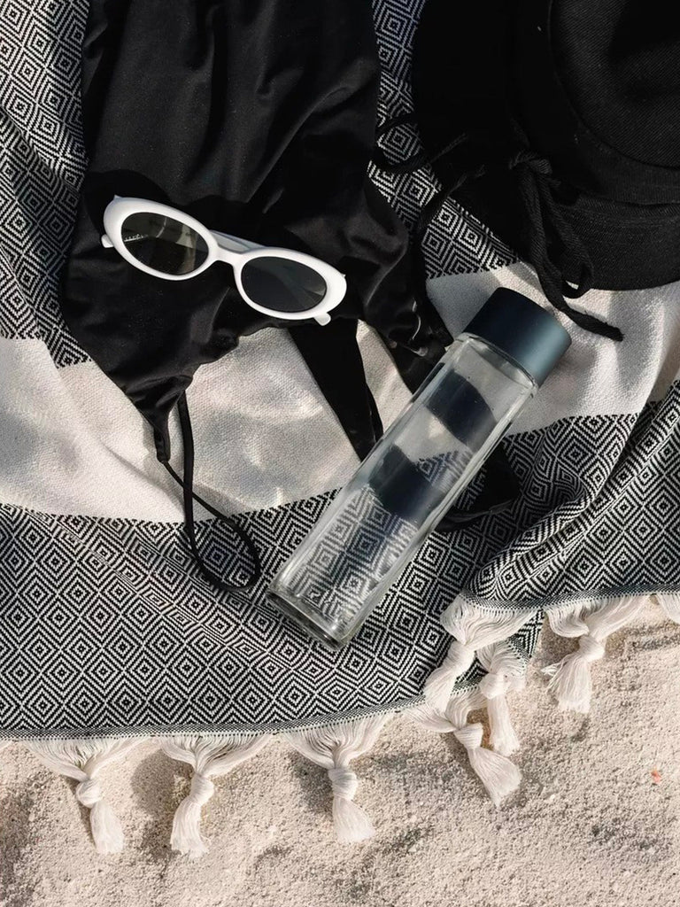 Serviette plage hammam coton, grande taille légère, séchage rapide, motif losange, franges tressées, modèle Ténor - Noir